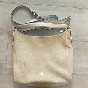 Coach cream side body purse.